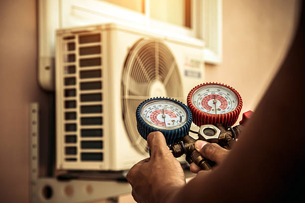 Professional Ductwork Repair technician working in Cedar Valley, UT